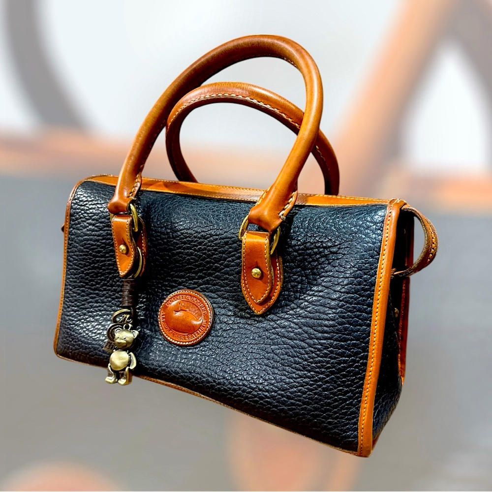Dooney and Bourke Satchel medium size pre-owned Navy Blue and Natural Leather.